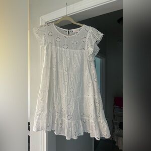 white mini dress. Size small. Worn a few times; still in good condition.